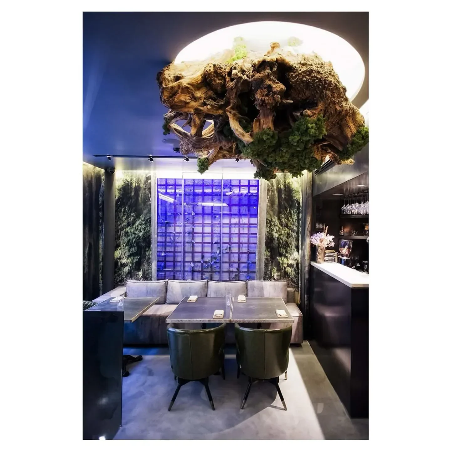 Unique interior design at 100 Maneiras restaurant in Lisbon, featuring wooden ceiling art.