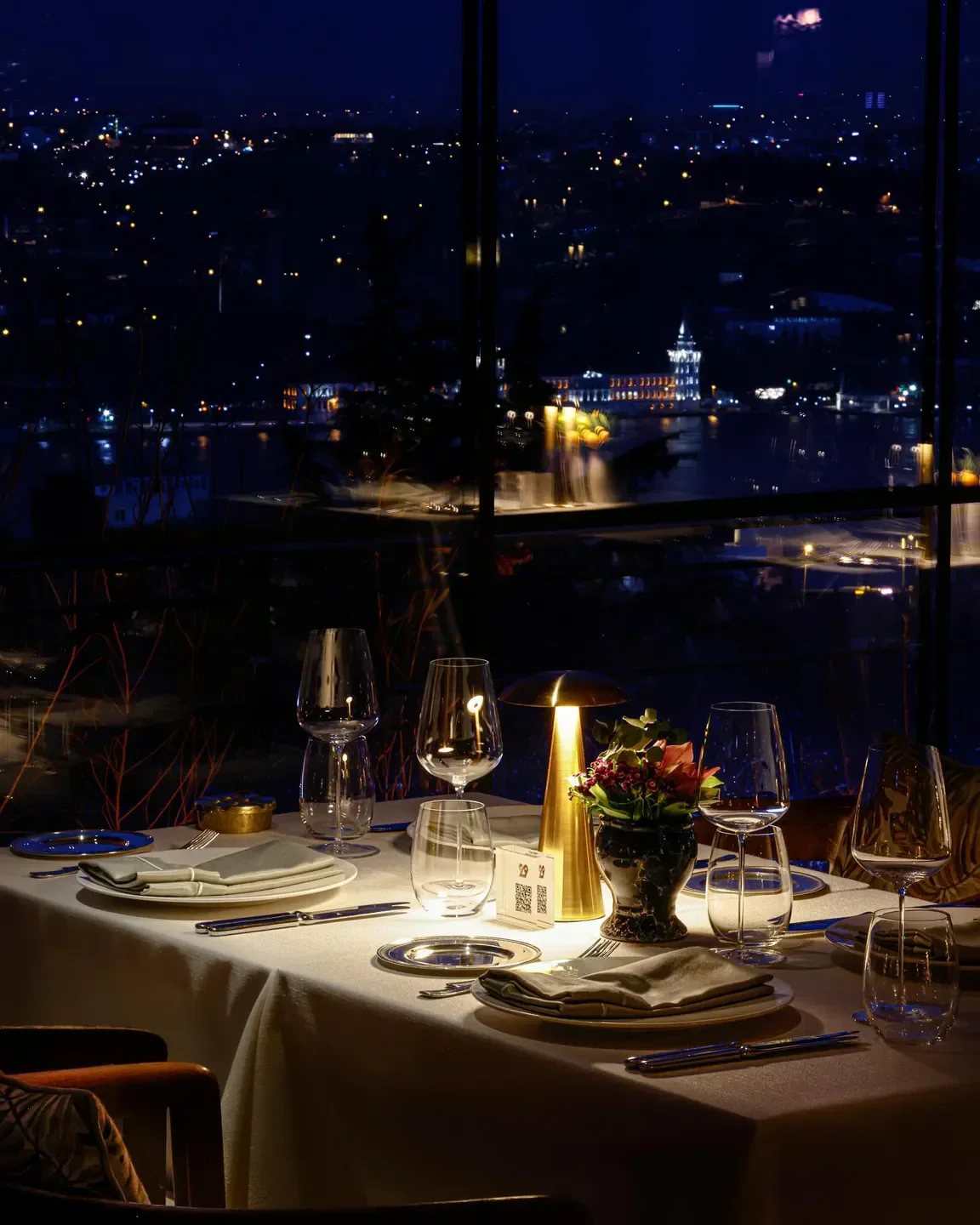 Romantic dinner setup at 29 restaurant in Istanbul with beautiful city night view