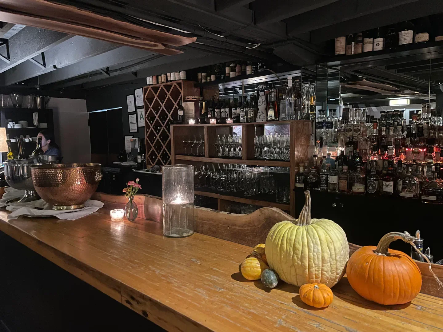 Cozy bar at 610 Magnolia restaurant in Louisville, pumpkins on the counter.