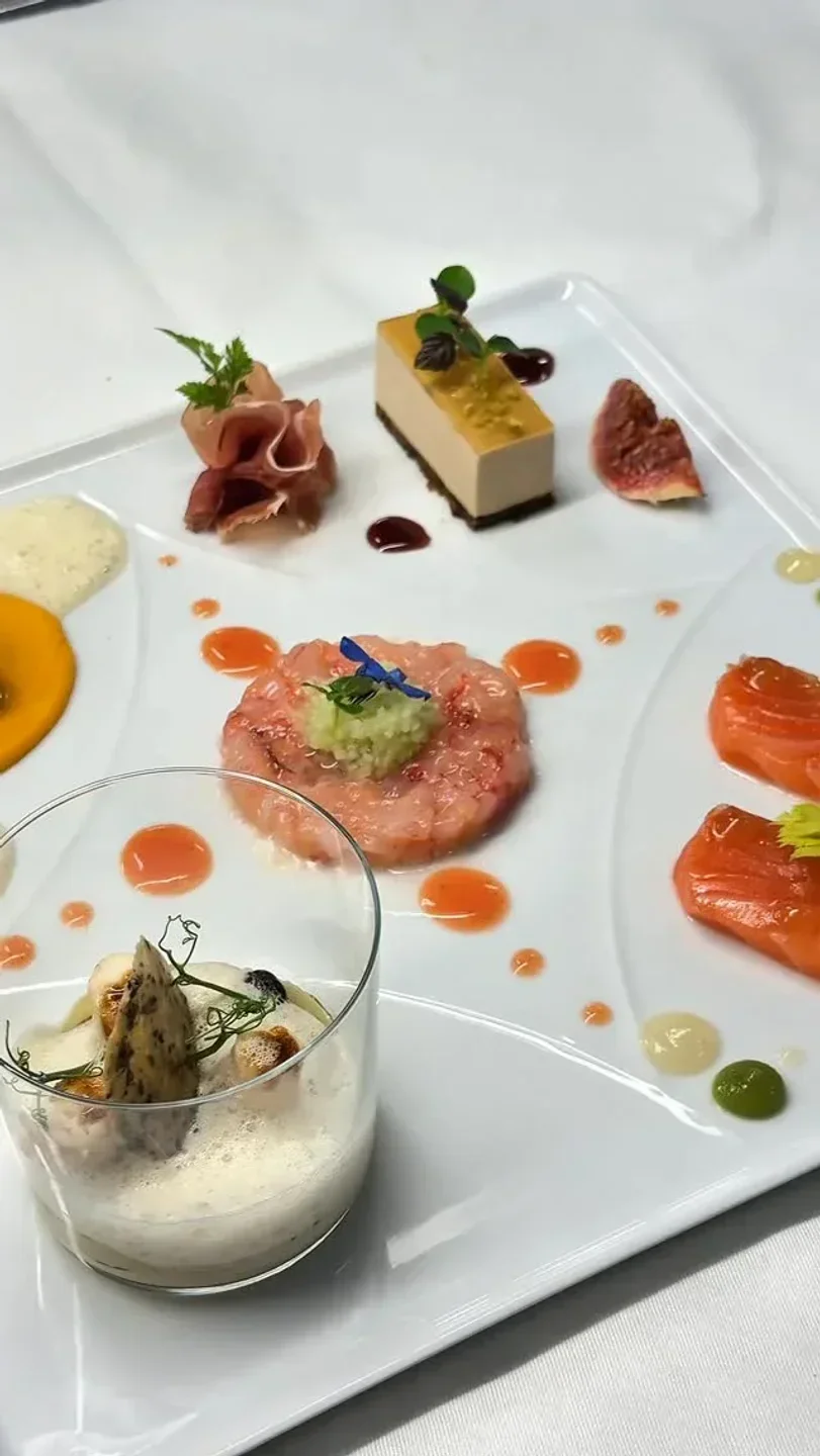 Delectable plate of food at Acquarello restaurant in Munich, showcasing fine dining.