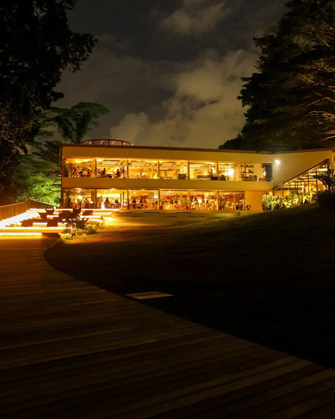 AIR Restaurant in Singapore at night, glowing lights and inviting atmosphere.