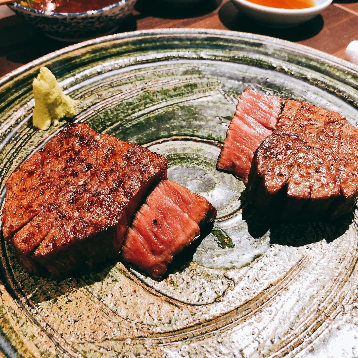 Delicious steak at Akasaka Raimon restaurant in Tokyo, served with wasabi.