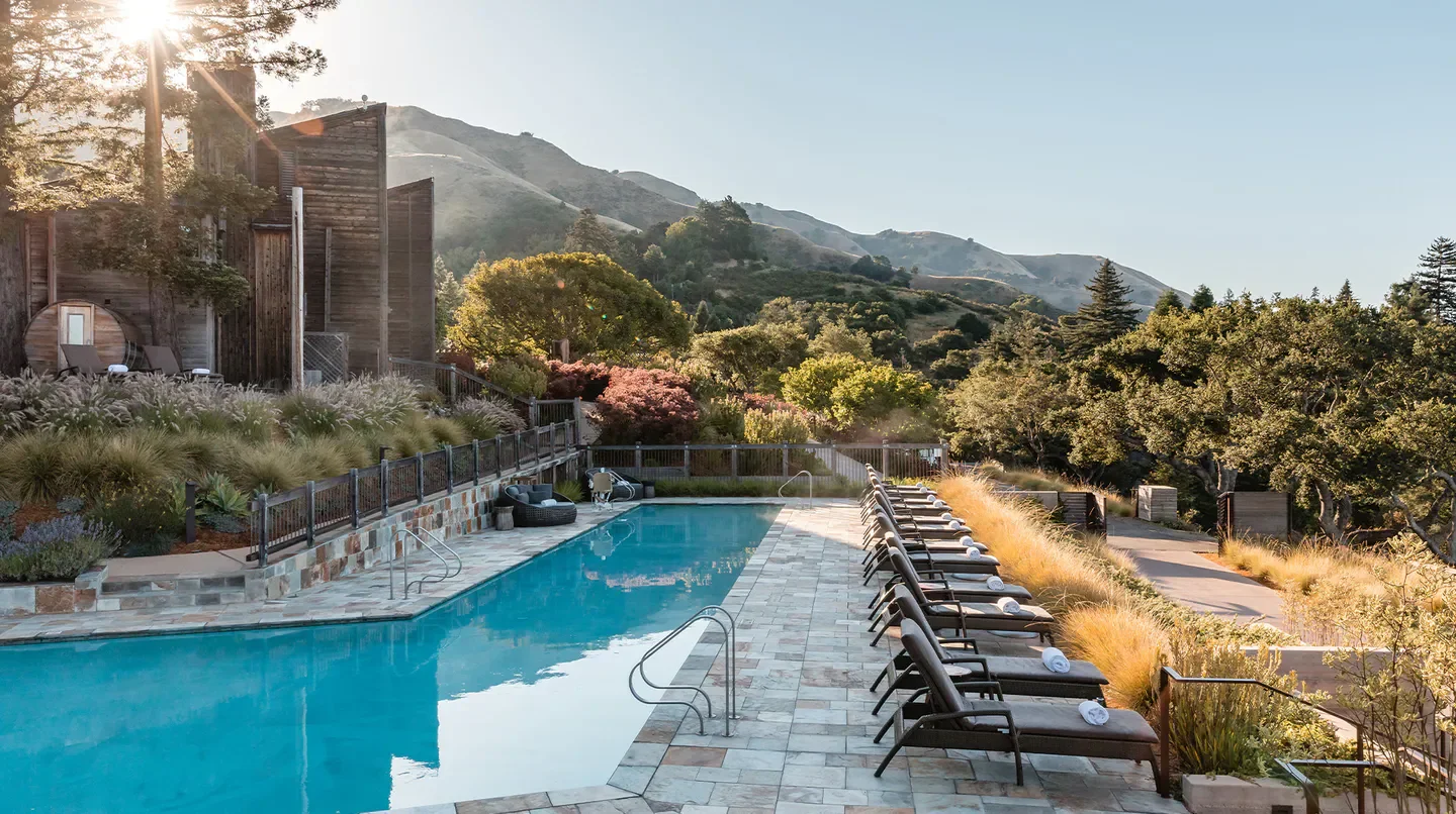 Pool and outdoor lounge at Alila Ventana Big Sur resort in Monterey, California
