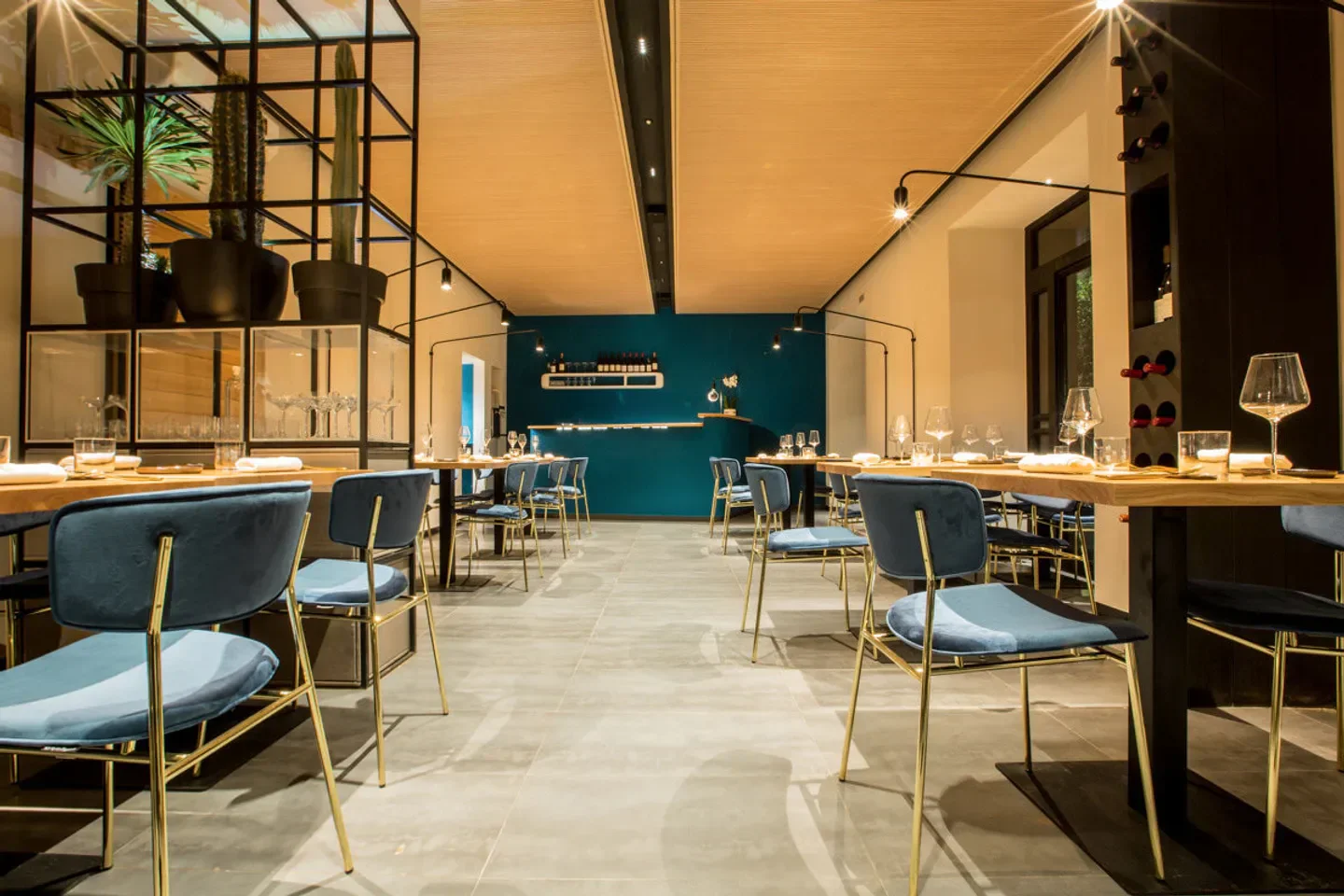 Stylish interior of Almàto restaurant in Rome, featuring elegant seating and decor