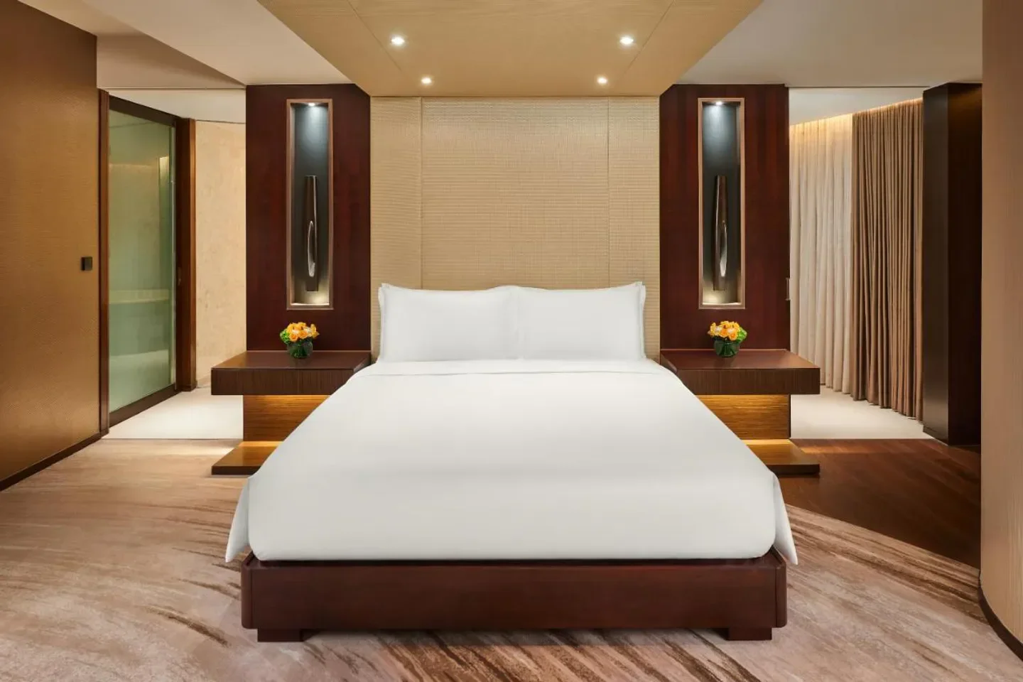 Luxury bedroom at Altira Macau hotel. Modern design and elegant details in Macau.