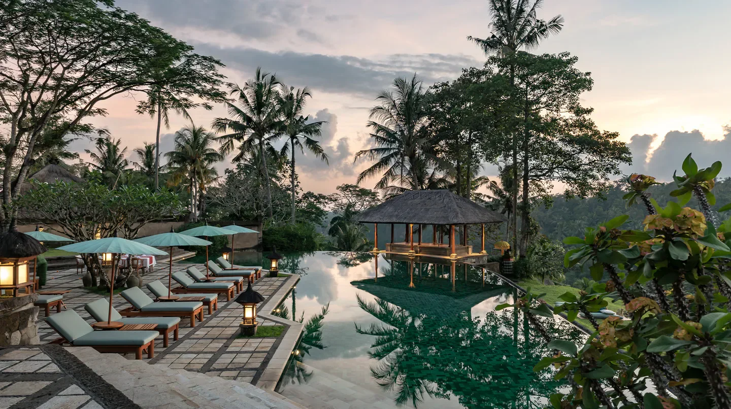 Stunning infinity pool at Amandari in Bali, with lush tropical surroundings and serene sunset views