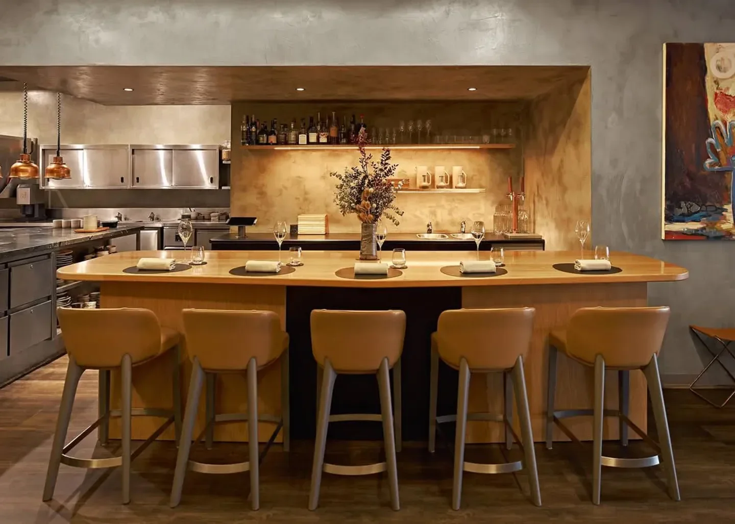Stylish bar at Amaru restaurant in Melbourne with modern decor and seating.