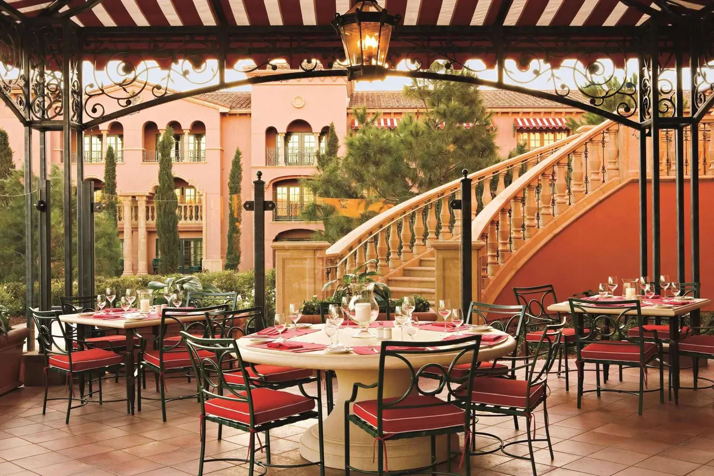 Outdoor dining area at Amaya restaurant in San Diego, featuring a romantic staircase.