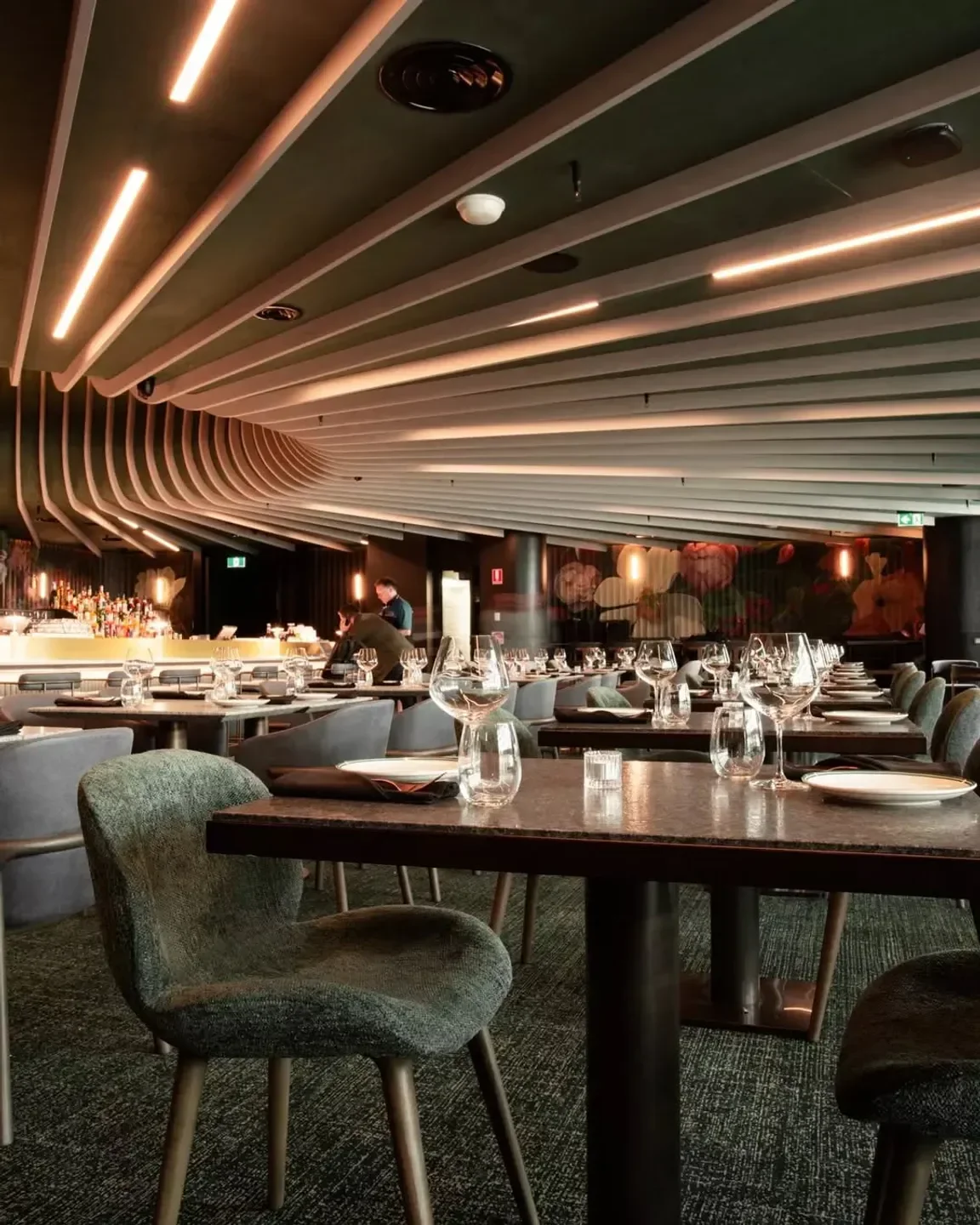 Modern interior of Amphora restaurant in Melbourne with stylish decor and lighting.