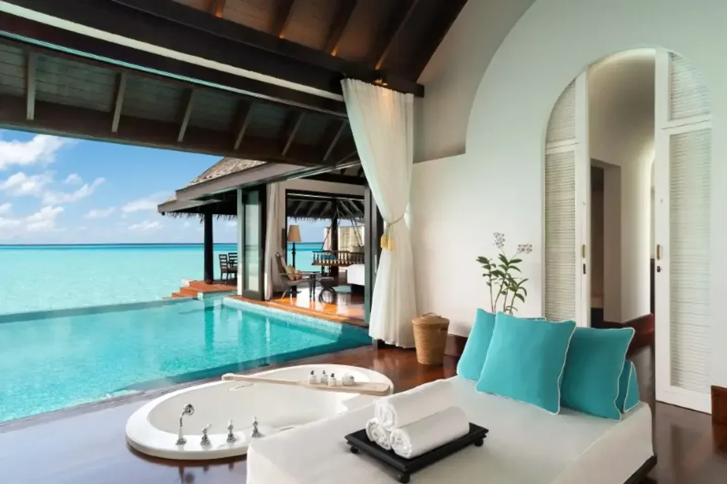 Luxury villa at Anantara Kihavah Maldives Villas with pool overlooking the Indian Ocean