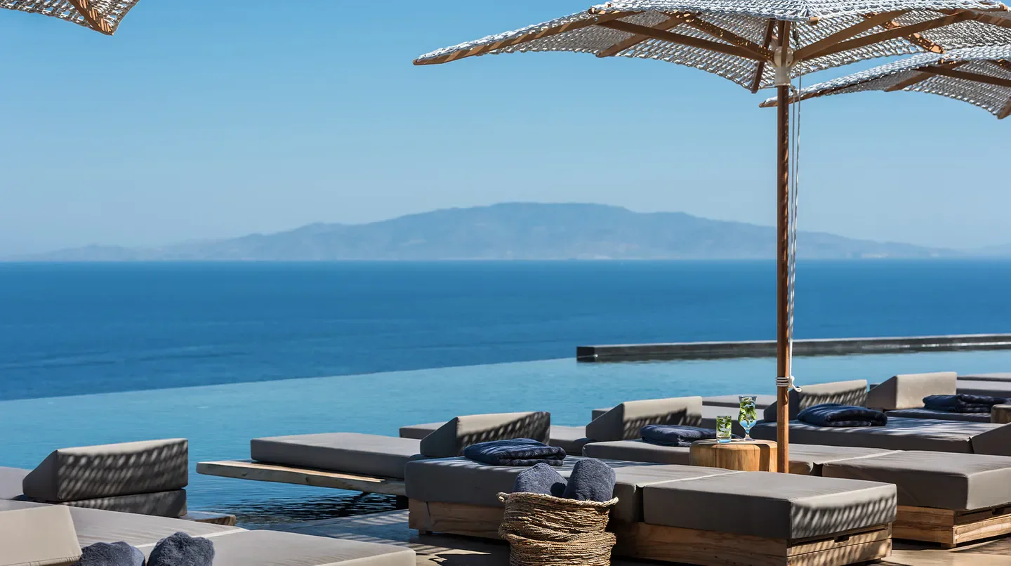 Relaxing lounge area with a view at Andronis Arcadia in Oia, Santorini, Greece.
