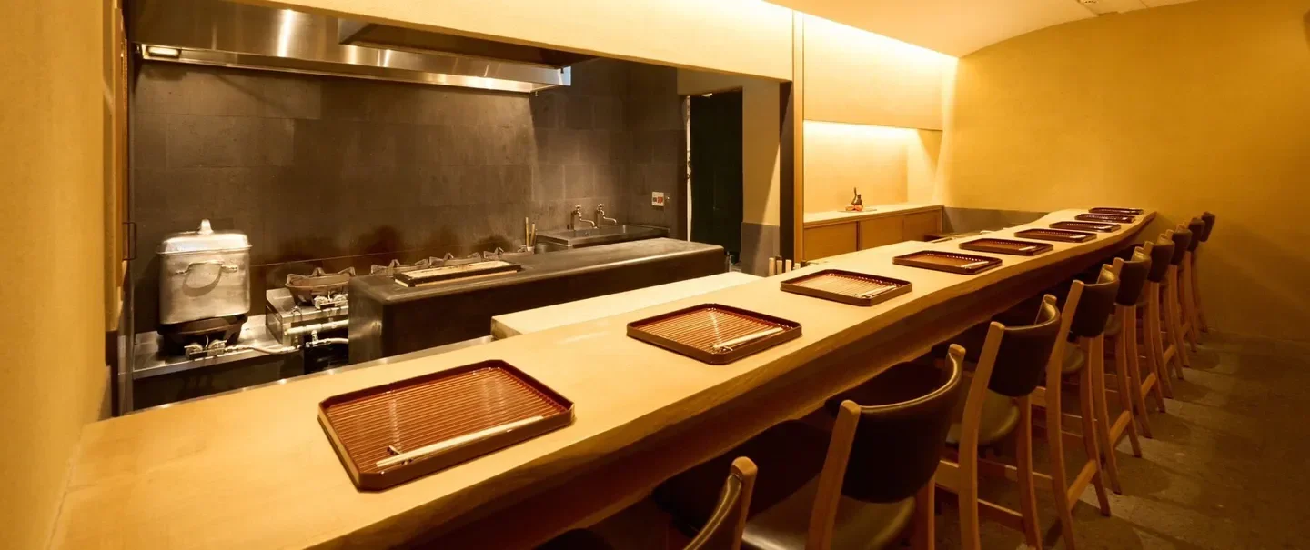 Interior of Ankyu restaurant in Kyoto, with a focus on its sushi bar