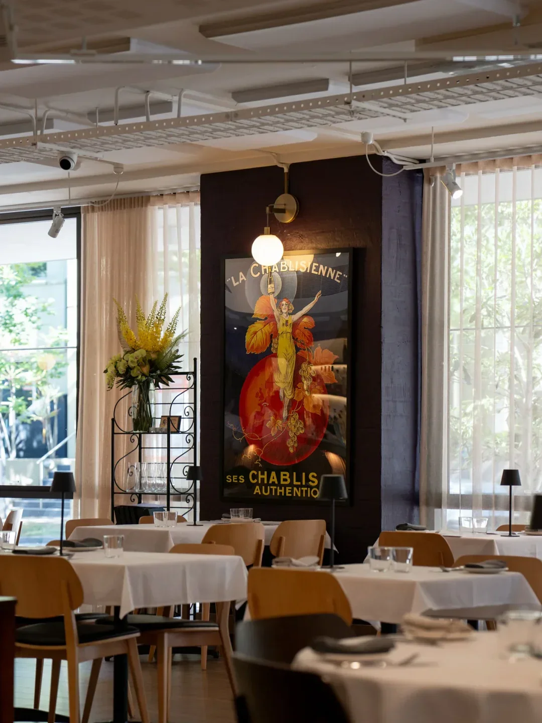 Annata Sydney restaurant interior with art, tables, and stylish decor.