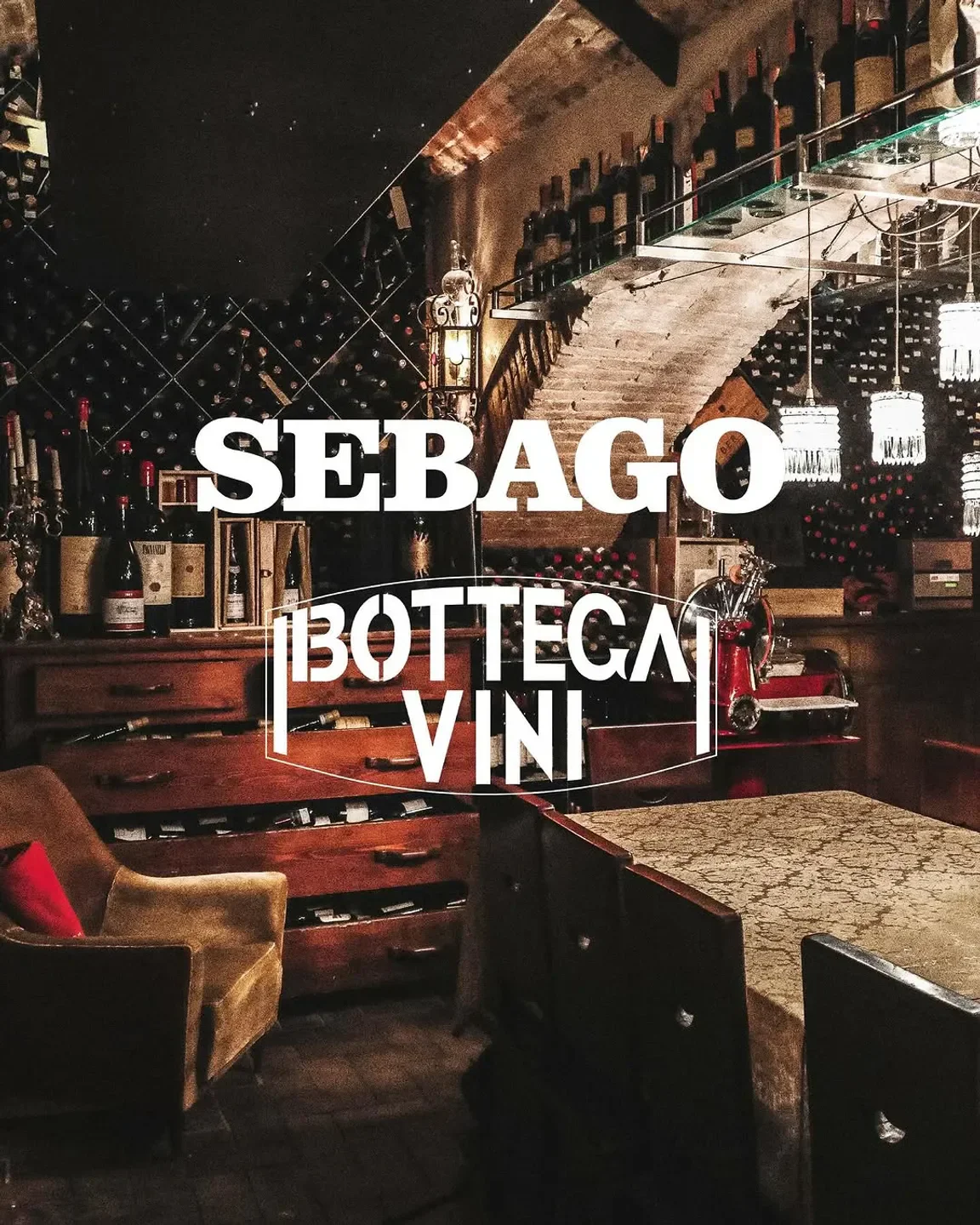 Cozy interior of Antica Bottega del Vino in Verona, featuring wine bottles and stylish decor.