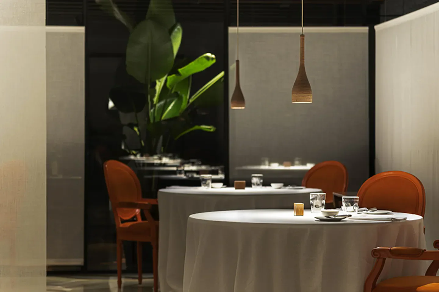 Elegant dining room interior at Antica Osteria Cera in Veneto, featuring stylish decor.