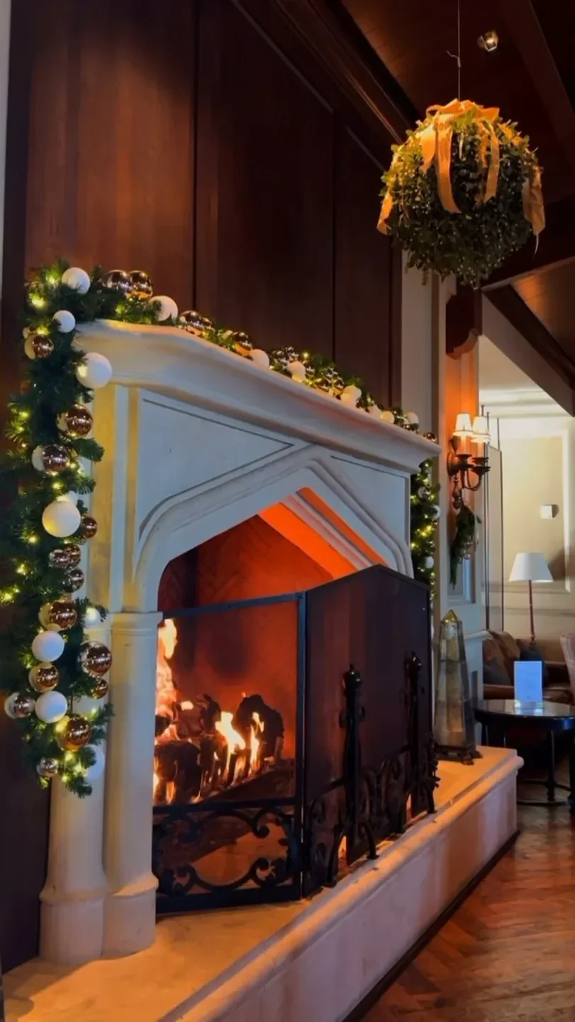 Cozy fireplace at Apex restaurant in Park City, decorated for the holidays.