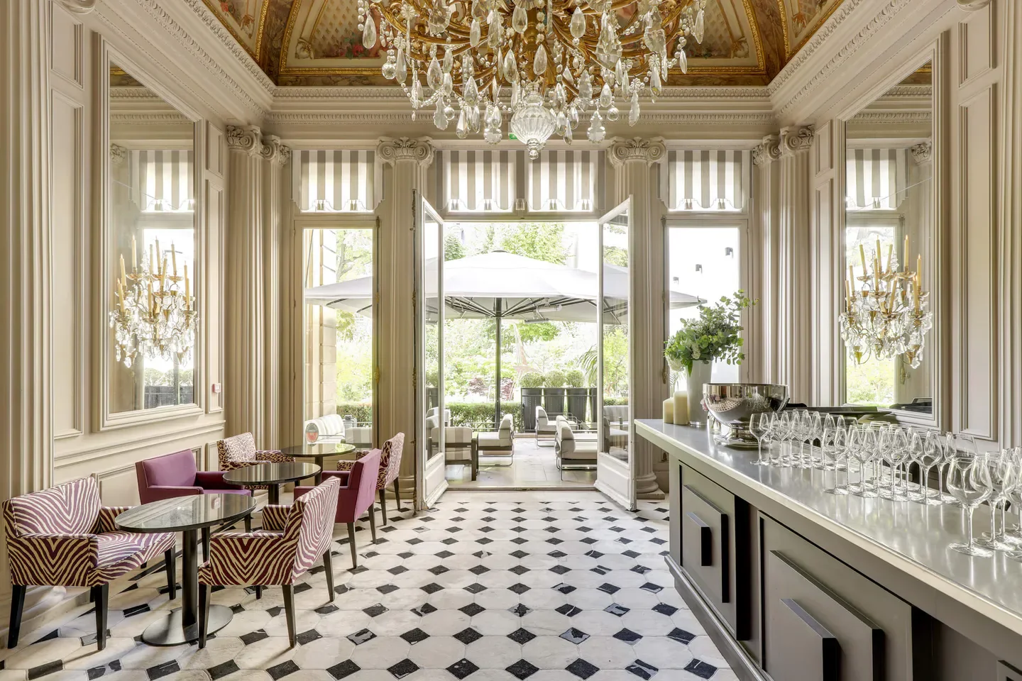 Elegant interior of Apicius restaurant in Paris, featuring a bright, airy dining space.