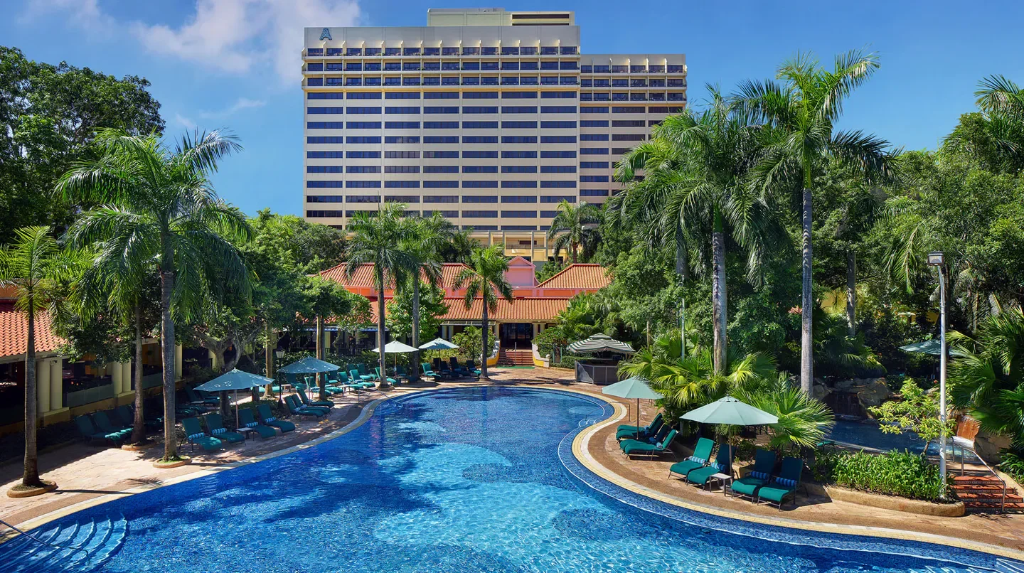 Pool and lush landscape at Artyzen Grand Lapa Macau in Macau, a tropical paradise.