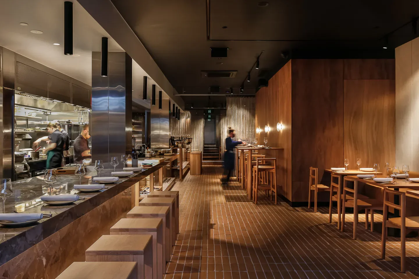 Interior view of ARU restaurant in Melbourne, featuring stylish seating and decor.