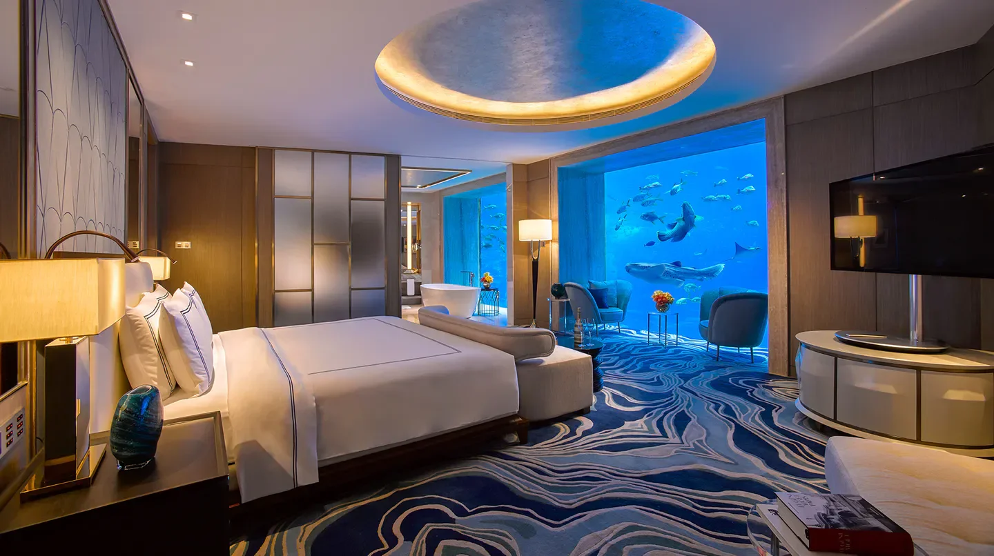 Atlantis Sanya hotel room with underwater views in Sanya, showcasing luxury and elegance.