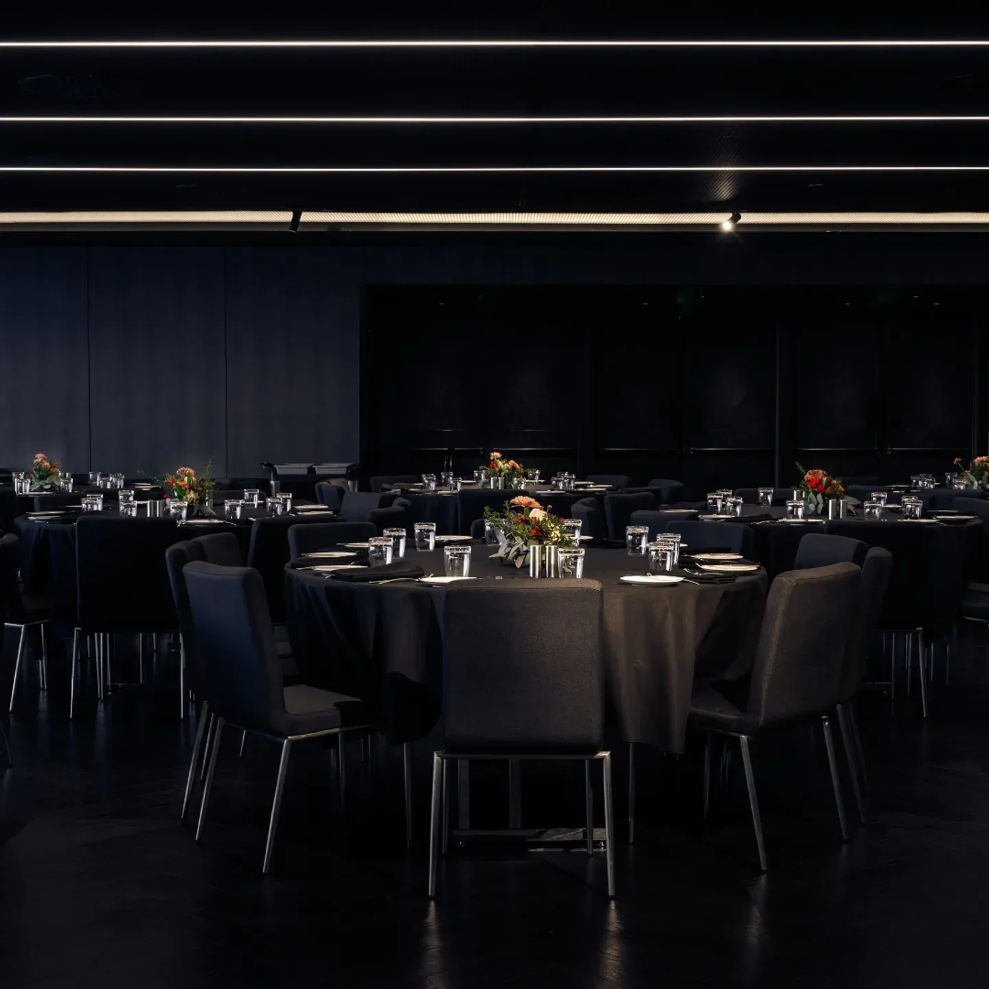 Elegant dining room interior at AURA Hobart restaurant, ready for service in Hobart.
