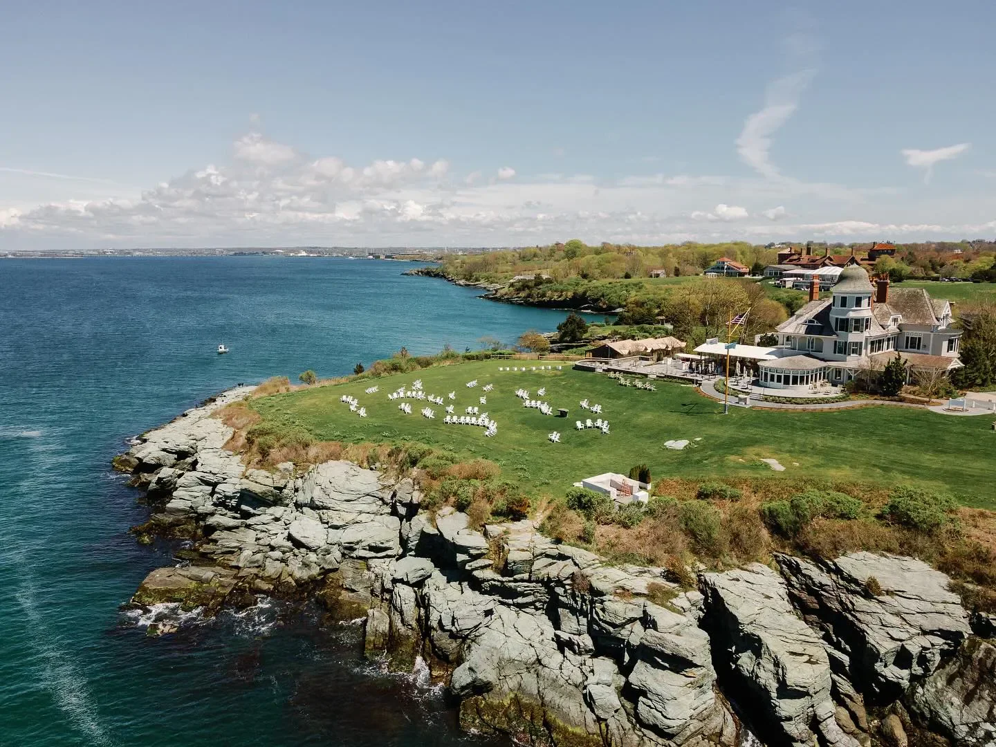 Aerial view of Aurelia at Castle Hill in Rhode Island overlooking the ocean and rocky coastline.