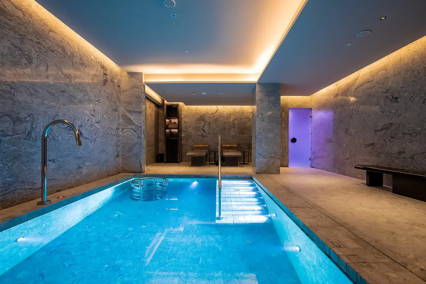 Indoor pool at Auriga Wellness at Capella Bangkok spa, a relaxing wellness experience in Bangkok.