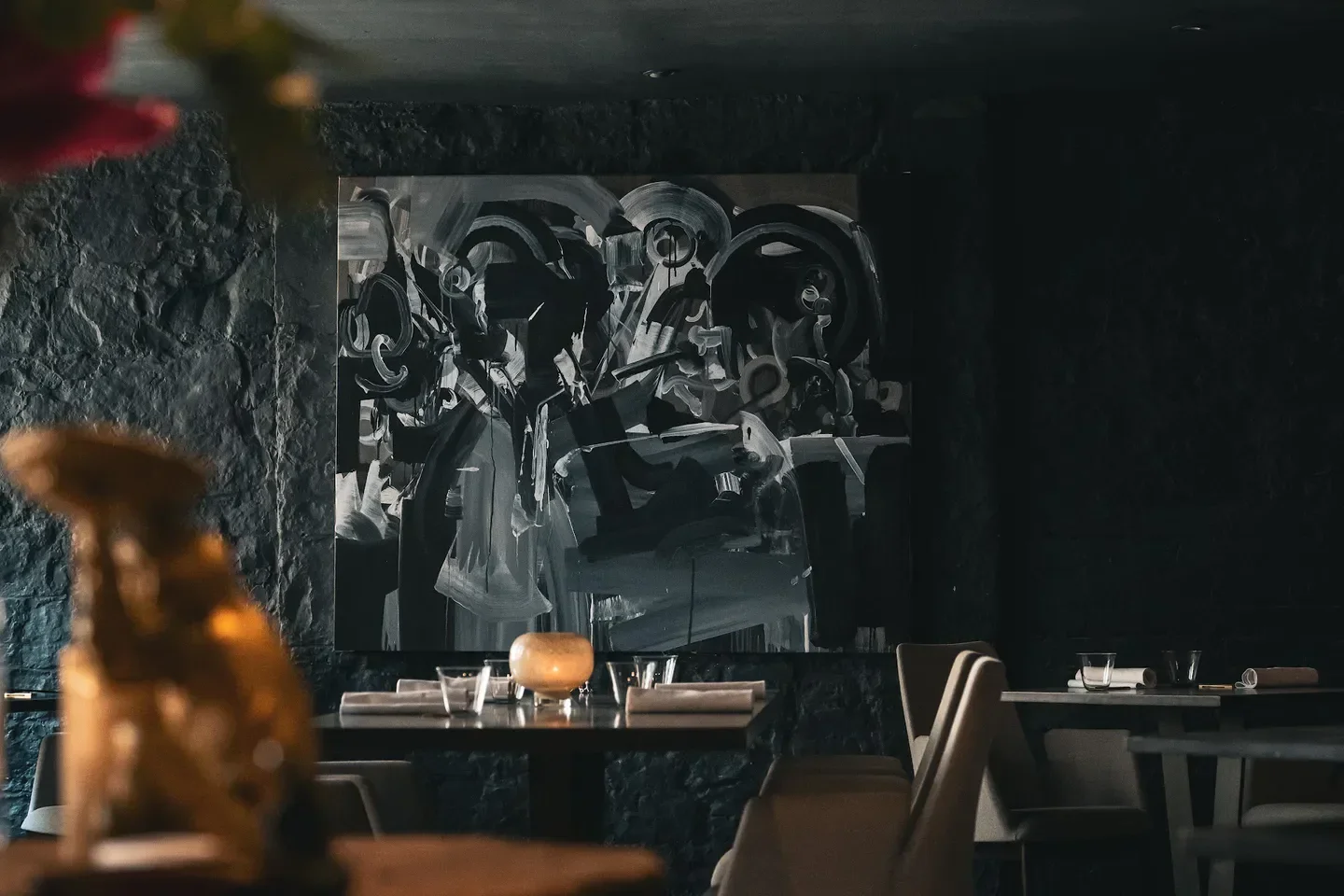 Stylish interior at Avery Edinburgh restaurant, with art and table settings in Edinburgh.