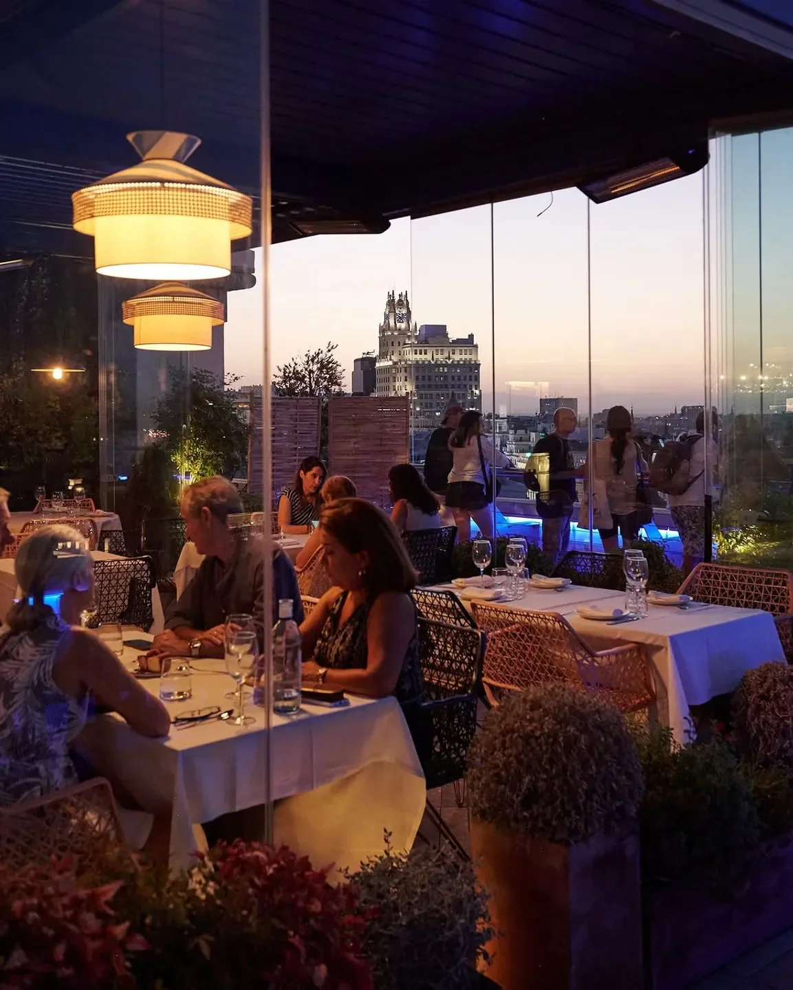 Dining at Azotea del Círculo in Madrid with stunning city skyline views.