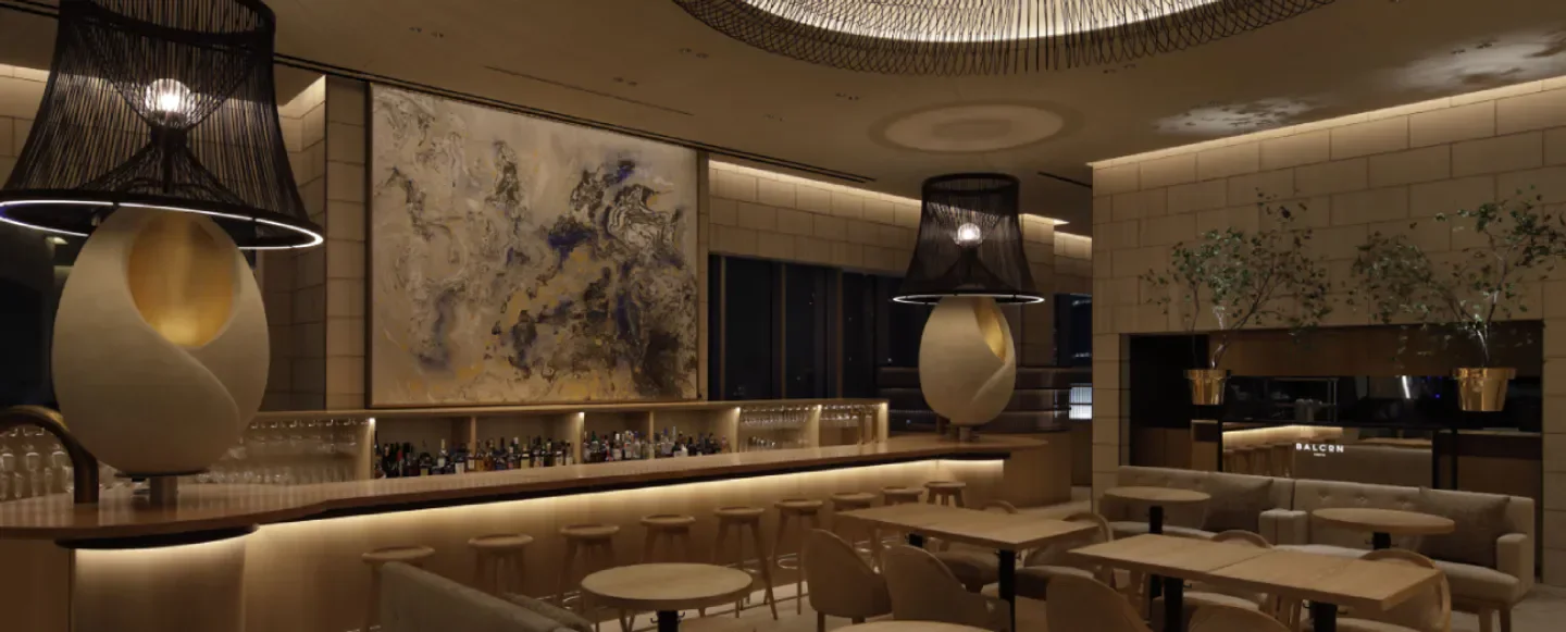 Stylish interior of Balcon restaurant in Tokyo, featuring unique lighting and bar area.
