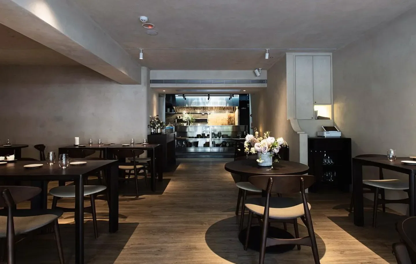 Interior dining space at Ban Bo restaurant in Taipei, featuring elegant decor.