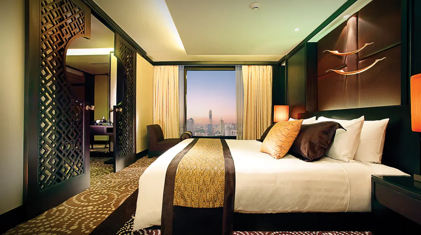 Elegant bedroom at Banyan Tree Bangkok with city skyline views in Bangkok.