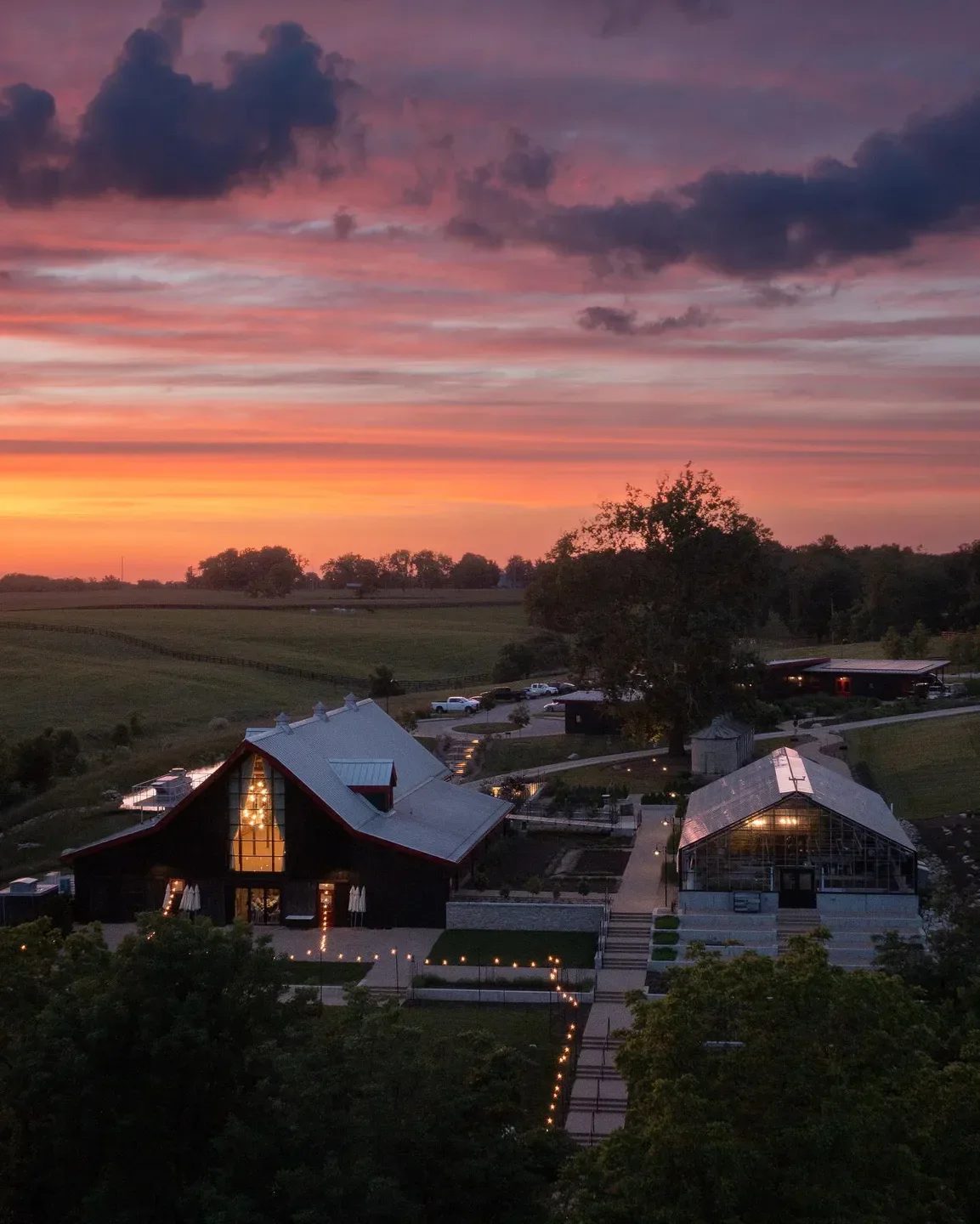 Barn8 Restaurant in Louisville at sunset, stunning aerial view of the restaurant and gardens.