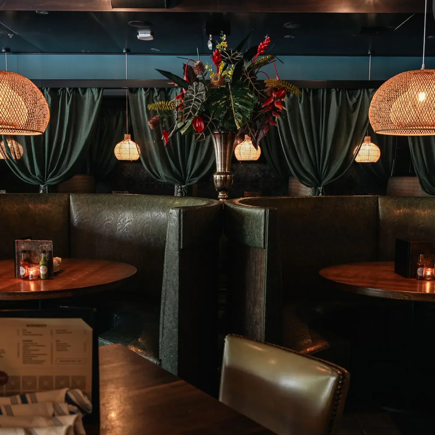Cozy booths and lighting at Barrio, a Chicago restaurant with stylish interior decor.