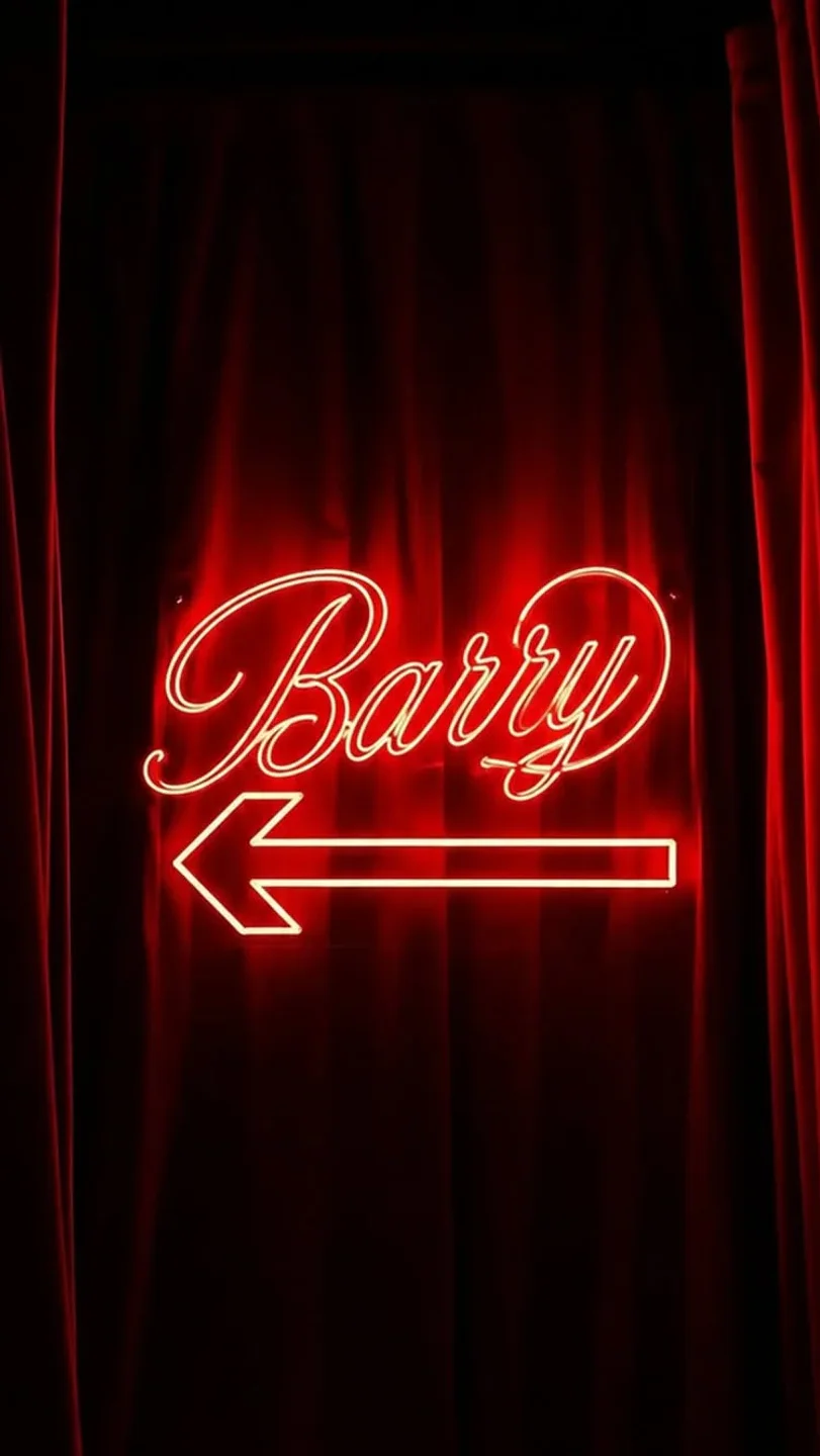 Neon "Barry" sign with arrow pointing left against red velvet curtains in the city.