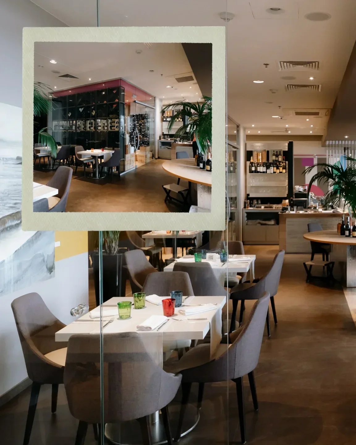 Interior of Bassano Ristorante in Kyiv, featuring tables with glassware and elegant decor