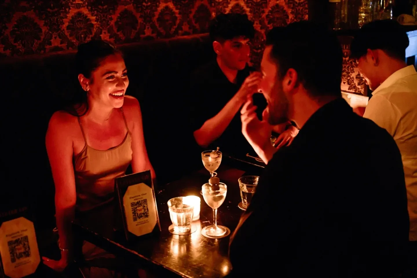 Enjoying cocktails at Bathtub Gin, a stylish bar in New York City.