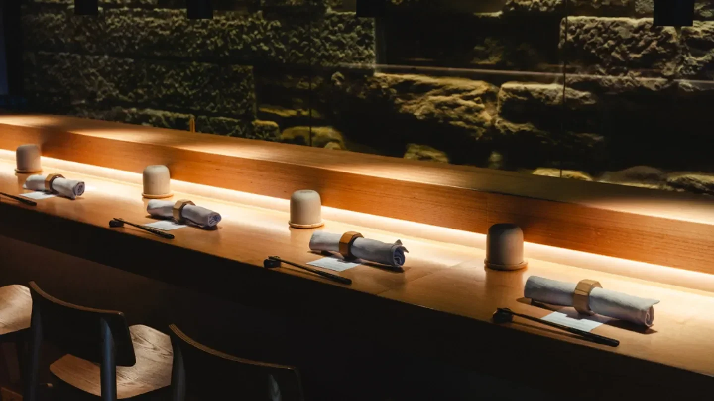 Interior of Bay Nine Omakase in Sydney, featuring a stylish dining area and lighting.