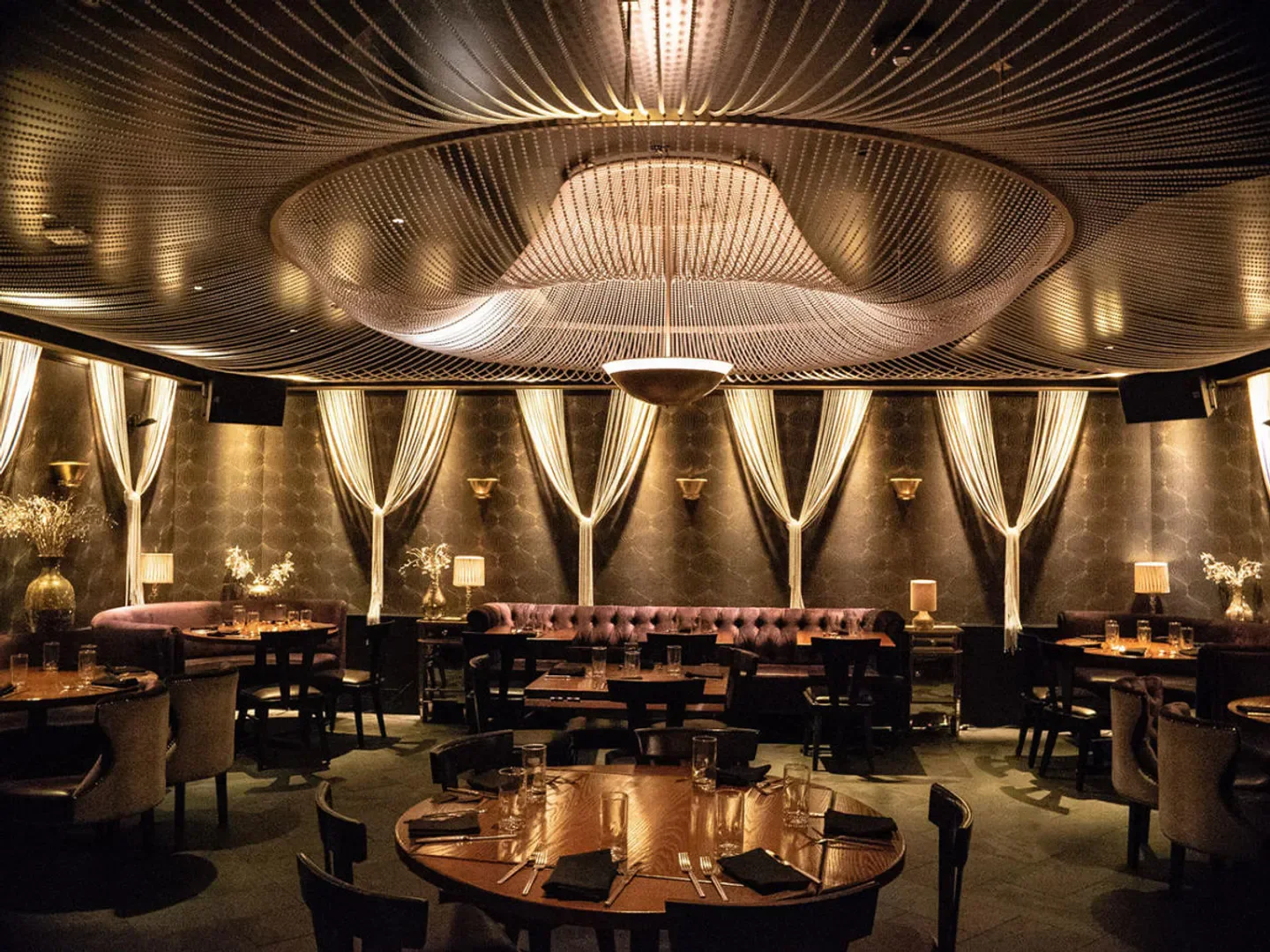 Elegant interior of Beauty & Essex restaurant in Las Vegas, with unique lighting and design.
