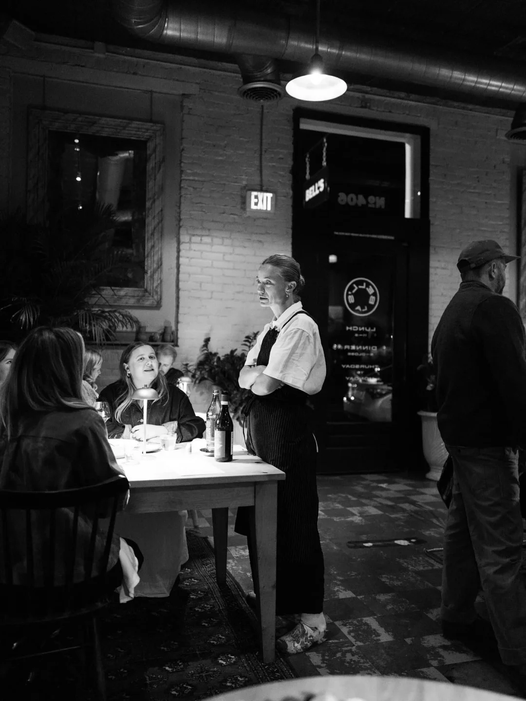 Elegant interior of Bell's restaurant in the Santa Ynez Valley, featuring diners and staff in a sophisticated setting.