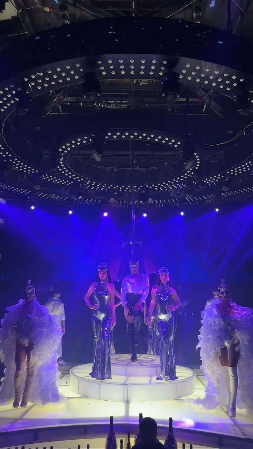 Performers on stage at BOA - Beat of Angels Bucharest nightclub in Bucharest, Romania. Nightlife entertainment with people in costume.