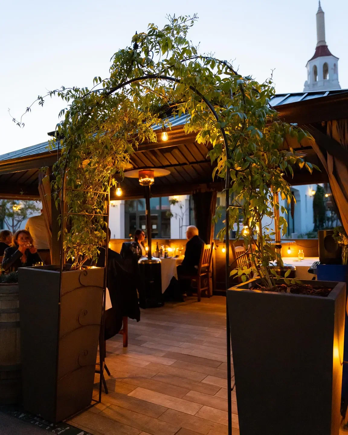 Outdoor dining at Bouchon Santa Barbara restaurant, with elegant decor in Santa Barbara