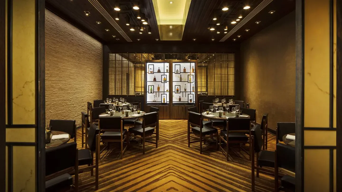 Interior dining space at Bourbon Steak Phoenix restaurant in Phoenix, with tables set for guests