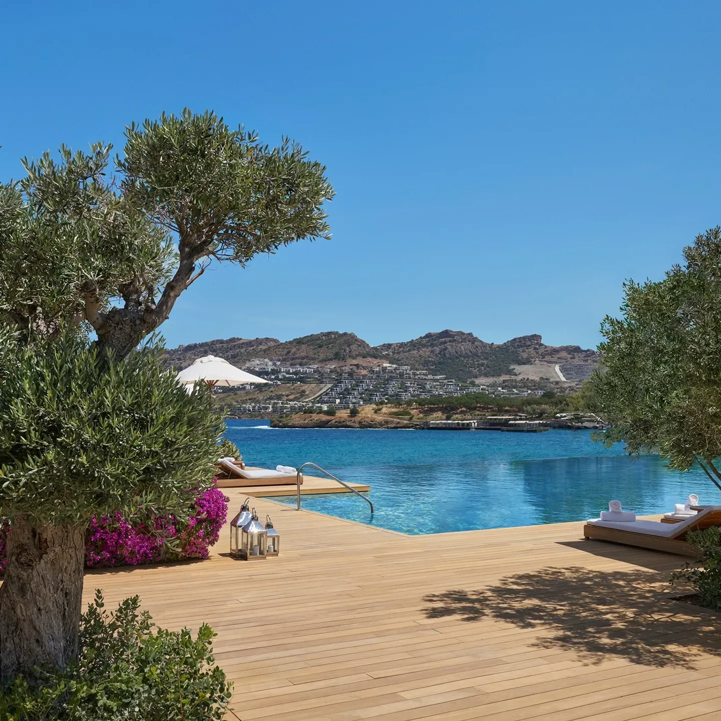 Stunning waterfront view at BRAVA by Stefano Ciotti in Istanbul, with pool and loungers.