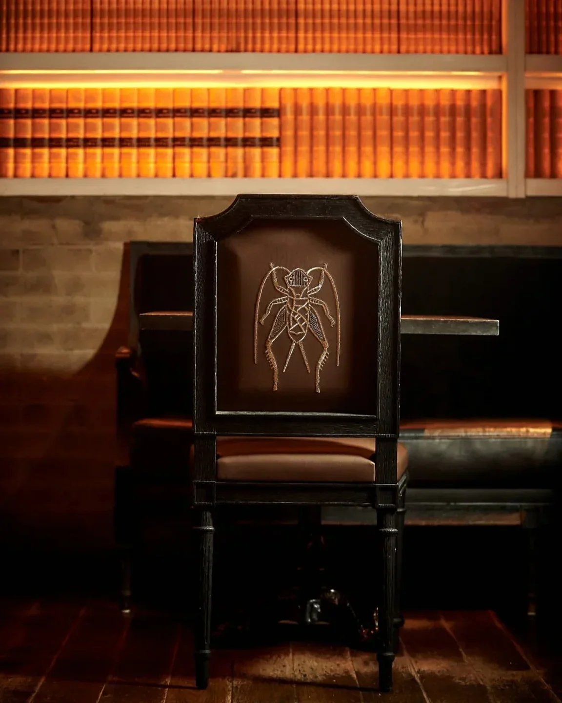 Intricate chair design at Buddakan, New York City restaurant, featuring a unique insect motif.