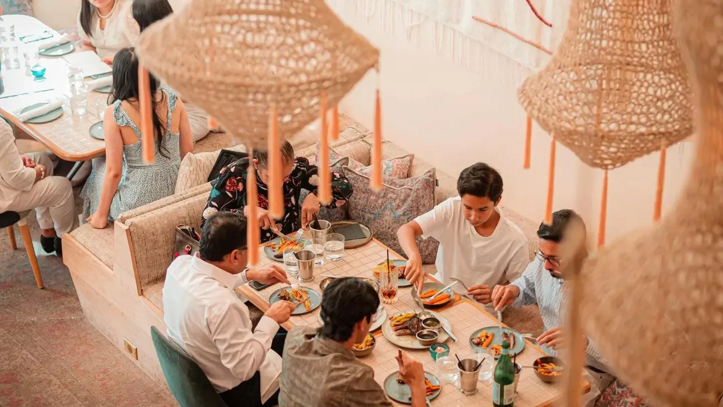 Dining at Byblos Toronto restaurant with stylish decor and delicious looking food.