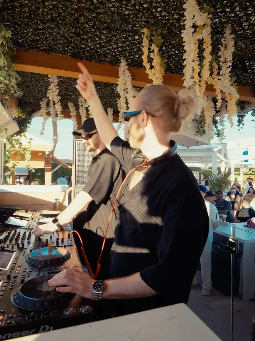 DJs performing at Cabana Pool Bar in Toronto, with a lively crowd enjoying the beach club.