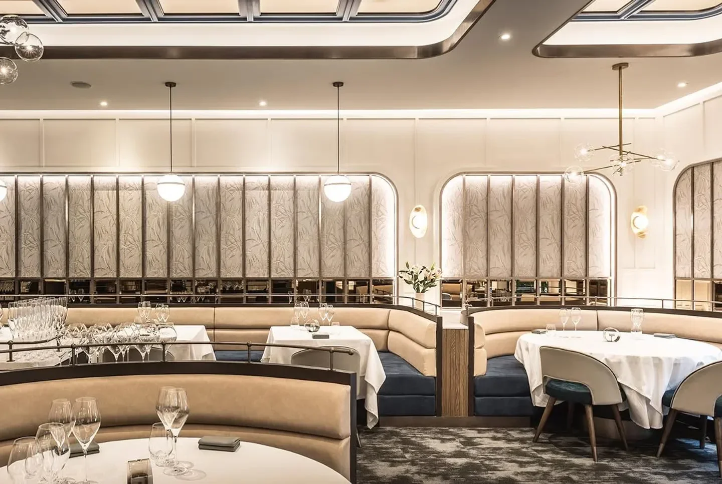Elegant interior of Cadence by Dan Bark, a stylish restaurant in Bangkok.