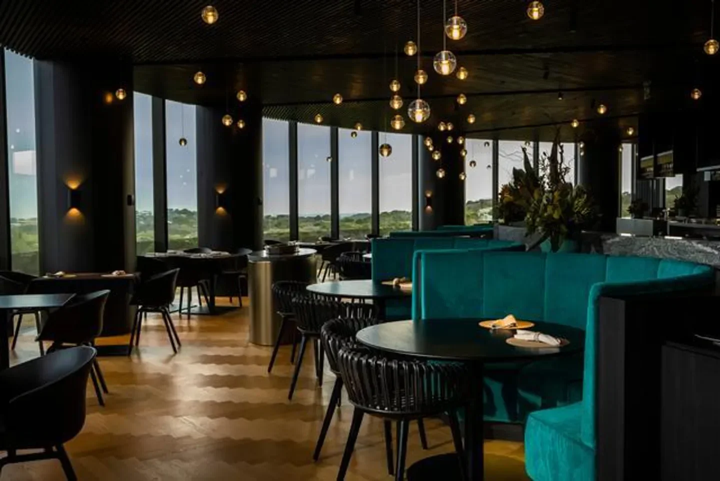Interior of Cape restaurant on the Mornington Peninsula with elegant teal seating and decor.