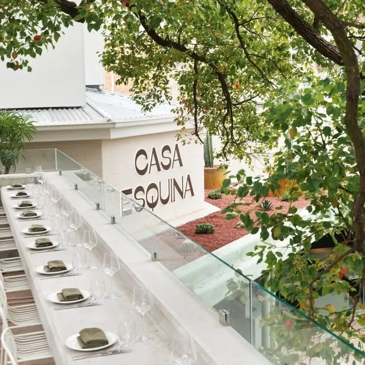 Outdoor dining setup at Casa Esquina restaurant in Sydney, ready for guests.